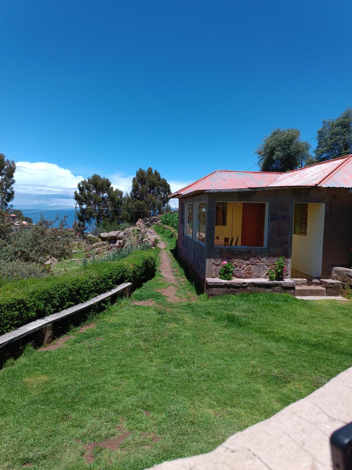 Hotel Taquile Familia Celso Huillanopampa Esterno foto